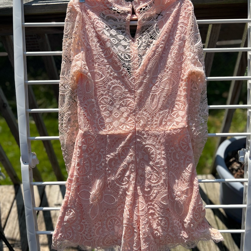 Very dressy romper size medium.